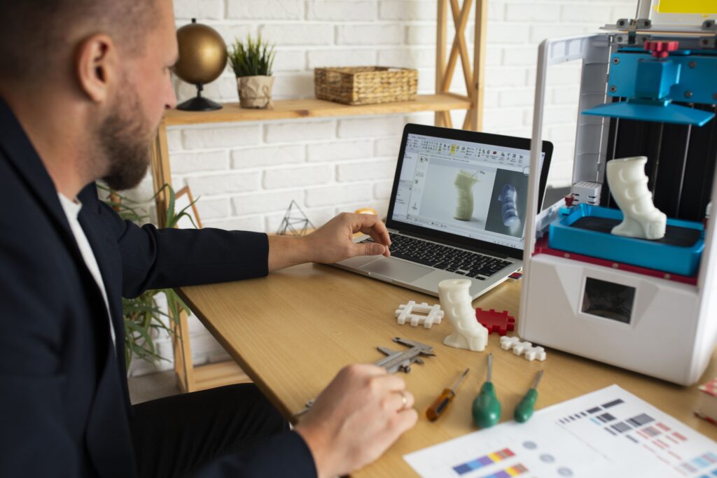 lifestyle-designer-using-3d-printer-min