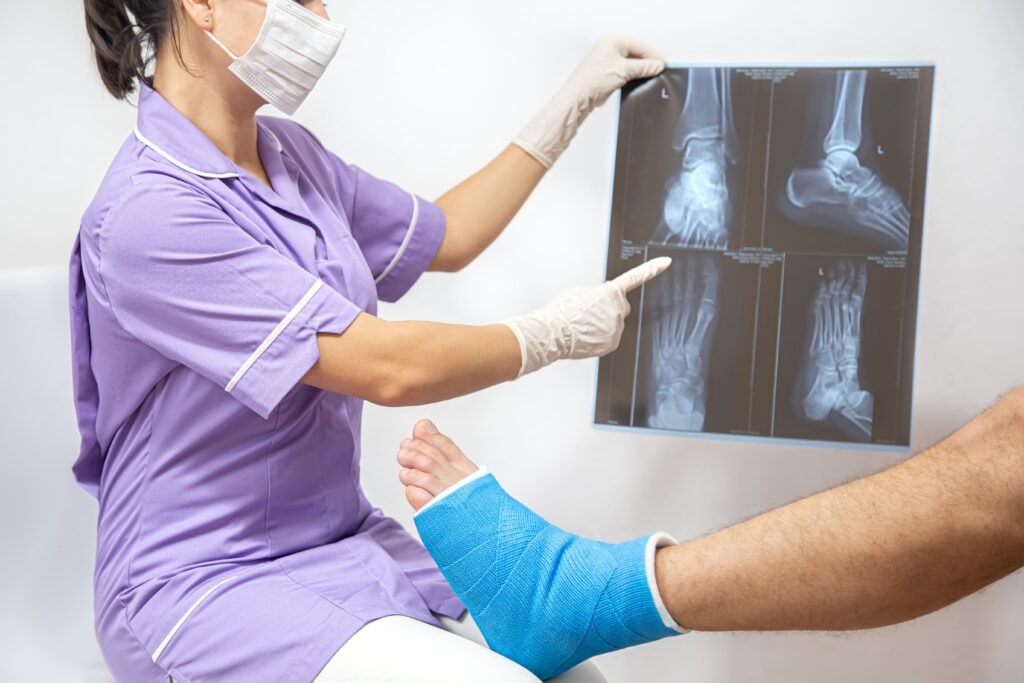 bone-fracture-foot-leg-male-patient-being-examined-by-woman-doctor-hospital-2